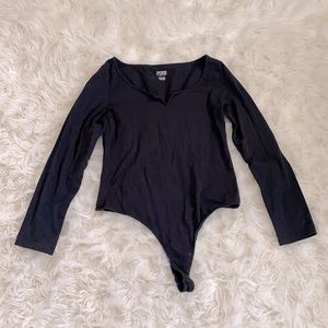 New Pink Victoria’s Secret Bodysuit size L.